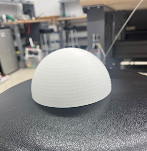 The 3D-printed white dome nose