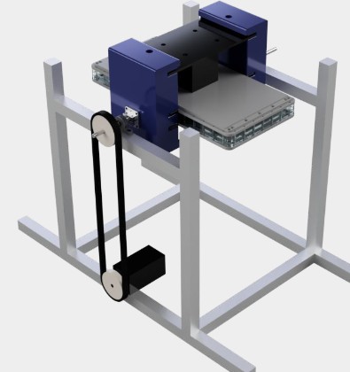 CAD render of the spinner: a bioreactor clamped between two blue fixtures on a rotating axle, driven by a belt and motor, on a metal frame
